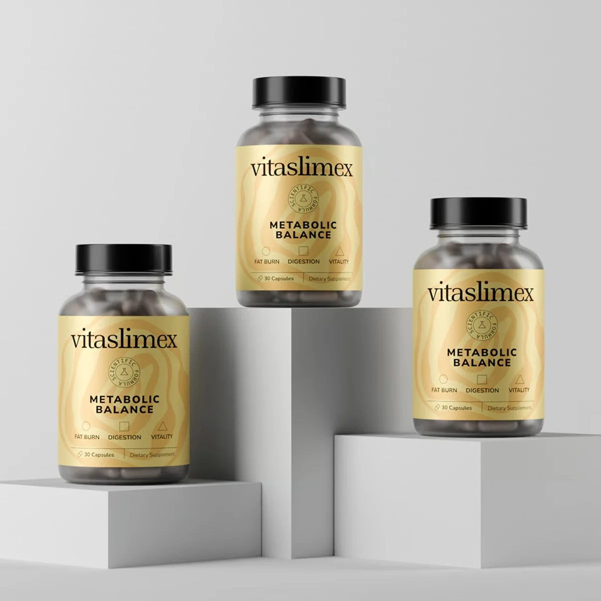 Three Vitaslimex supplement bottles